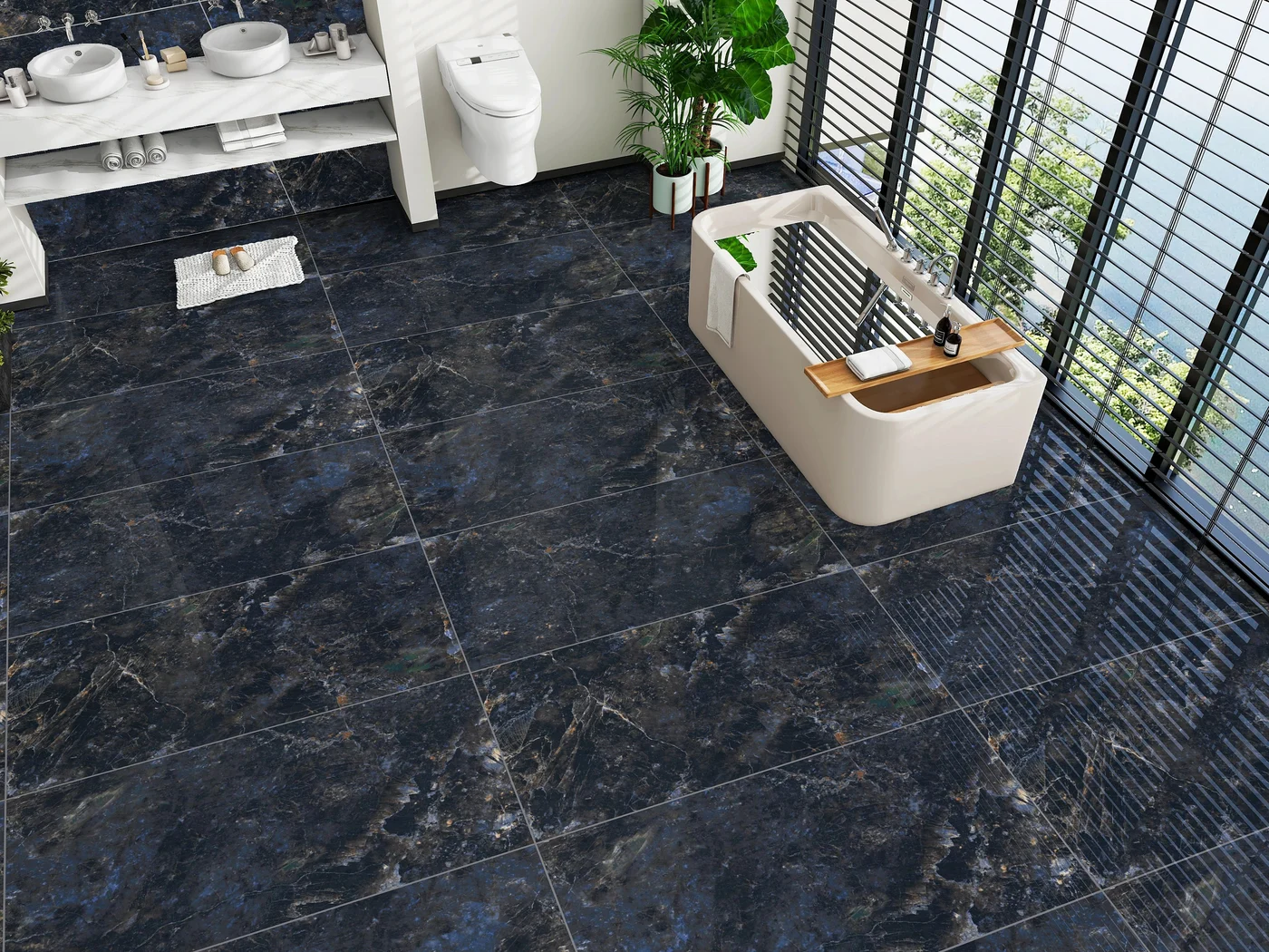 Deep blue stone-look floor and wall tiles in a bright bathroom